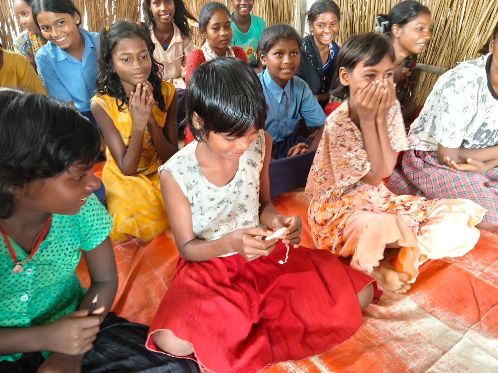 Girls and women participating in menstrual-health learning